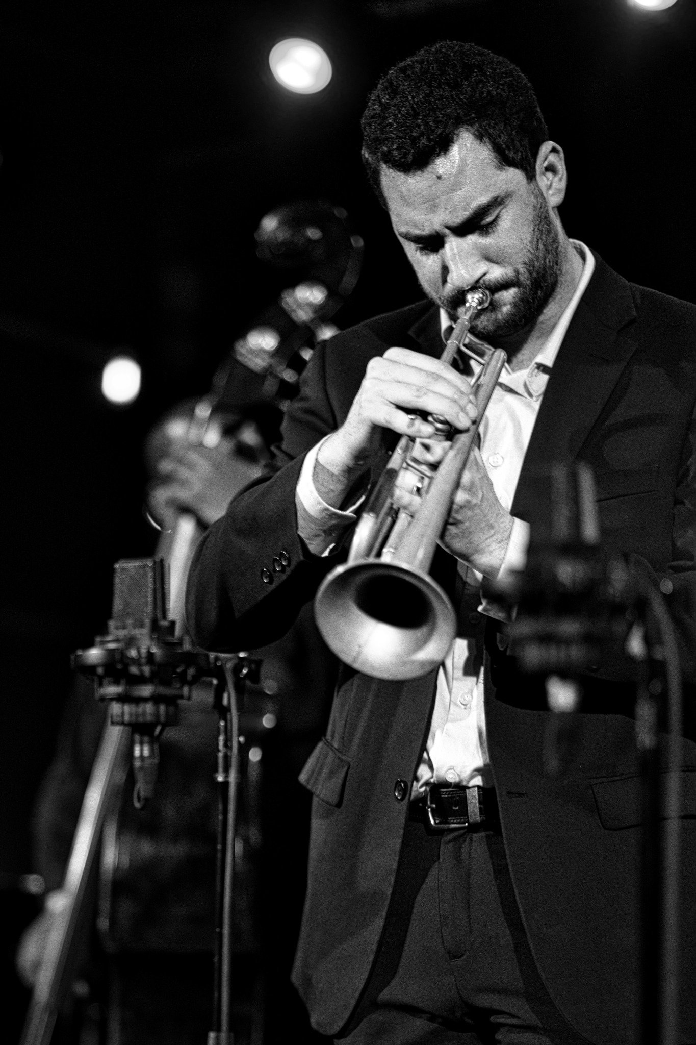 Andrew Wagner performing in black and white